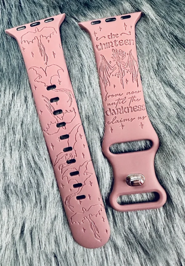 Engraved watch band with The Thirteen artwork.